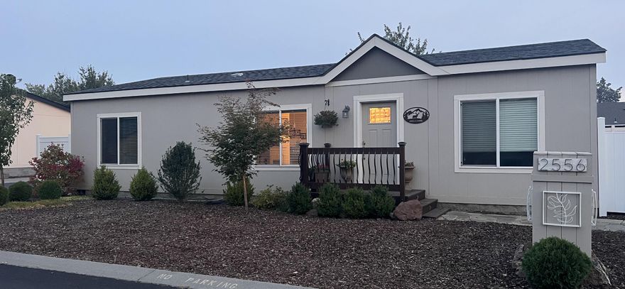 Welcome to this delightful 3 bed, 2 bath corner lot with zeroscaped yard with a 2 car detached garage. Enjoy summer evenings on your large deck and custom bar area. Inside you will find an open floor plan with lots of natural light, laminated flooring and new appliances. Call your favorite agent for a private showing.