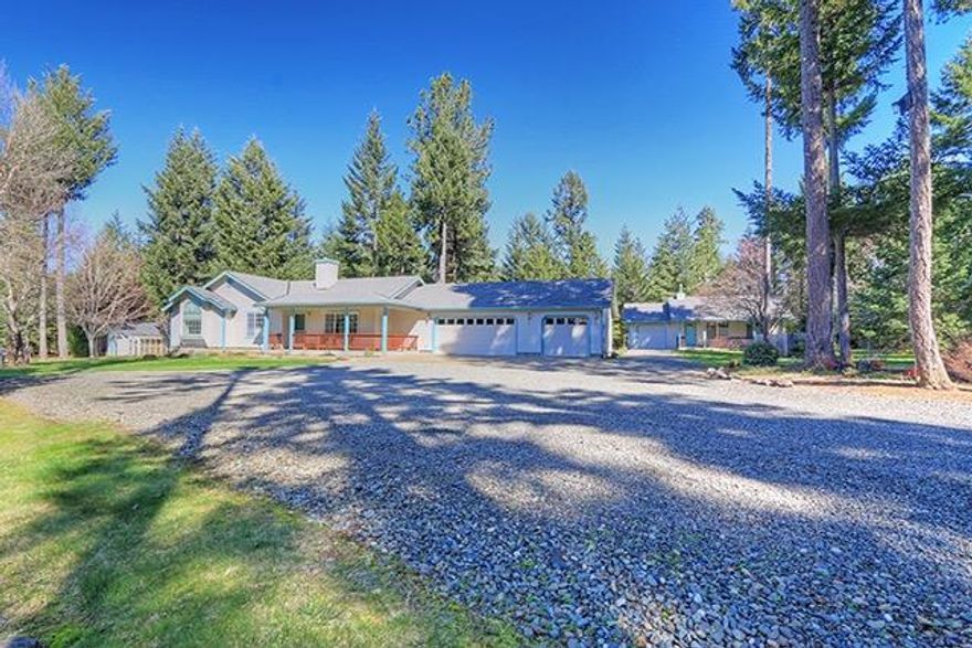 Pristine & Private Custom Home & Award Winning Guest House, 5 acres, Fenced, Elec. Gate, 3 car garage on Main House w/attached finished shop. 1 car garage attached to guest house. Exposed aggregate pathways. Wrap-around porch. Ceramic tile, White Oak Flooring, Granite Counter tops, Stainless Steel Refrigerator, Gas Range/Oven, Walk-In Pantry, Wood-Wrapped Window Sills, Bull-nosed Corners. Levelor Blinds. Slate Shower w/ Glass Tile. Double sinks. Heat Pump & Cozy Lopi Woodstove. Large enclosed Sunroom/Patio. Guest House w/Attached Garage, kitchen w/gas range/oven, d/w, concrete strand board exterior. Master Gardener Fenced Garden. 2000 ft of water pipe w/ pop-up sprinklers. Hot house w/garden sink. Established Fruiting Trees: Peaches, Pears, Plums, Apples. Excellent well, 40 gpm per Seller. Property is located within a mile of botanical trails and world-class fishing, 10 minutes from downtown Grants Pass. For the most discriminate Buyer, this property is offering a Clean Home Inspection