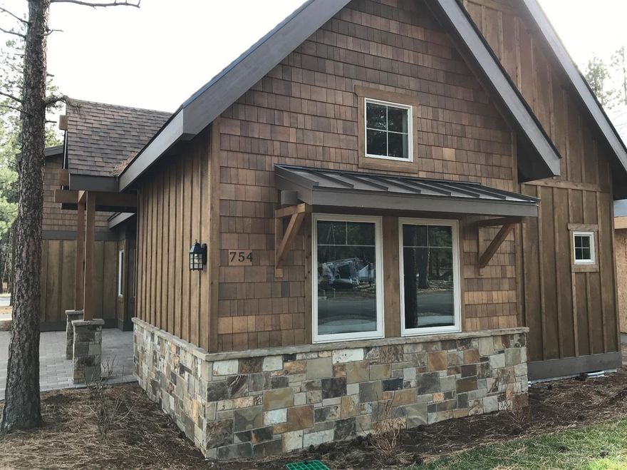 Would you like a modern luxury cabin near world class dining, entertainment, hiking & biking? Then this cabin nestled in the pines is perfect for you! Master suite on the main allows you privacy as you host friends & family in beautiful Sisters, Oregon. You'll want to visit this sunny spot often, but it could also be rented as AirBnB, ask for details. Elegant built-ins flank a gorgeous stone floor-ceiling fireplace. Outdoor paver patio space & beautiful landscaping add to your extraordinary retreat!