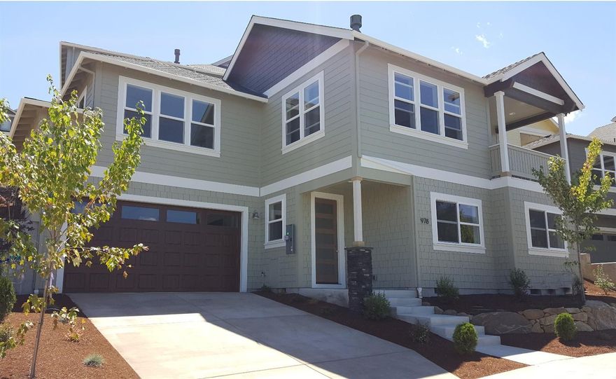 Beautiful New Ashland Earth Advantage Certified Home with Lovely Valley Views! You'll just love the elegance, style and exquisite amenities of this imaginatively designed Meadowbrook Park home including main level living with master suite, expansive vaulted living room, hardwood flooring, contemporary kitchen, granite counters, island and Energy Star stainless appliances. The home features extensive natural light and comfortable decking all nicely situated to take advantage of the great Ashland views. The lower level includes a family room, two additional bedrooms, shared bath, contemporary fixtures, good storage, sunny windows and an double garage. Solar ready with conduits & roof space for solar panels. Meadowbrook Park at North Mountain is Ashland's All-Ages Destination Neighborhood.