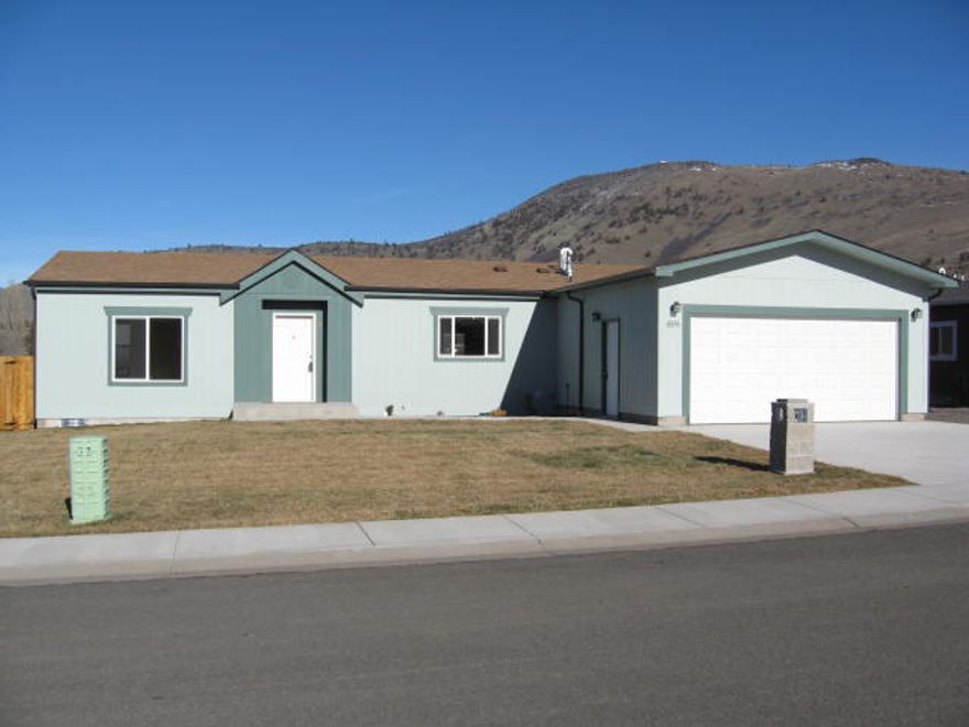 Beautiful new home located in a very quiet suburban location. Home has a very open floor plan and lots of sunlight. This is an energy star home which includes 2x6 construction, R40 and R31 insulation. High efficiency stainless steel appliances. Gas heat and central air. Garage is insulated and fully finished. Home also includes: garage door opener with exterior key pad, in ground sprinklers in front and back yard, fully landscaped, rain gutters, and a nice rear wooden deck.