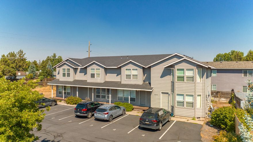 This fully leased fourplex is in a prime east side location near the hospital, popular restaurants and retail shops. This exceptional property not only offers a lucrative investment opportunity with existing rental units but also presents the potential for further development. Buyer to verify with City potential development opportunities on additional land. 

Three units are 2 bedroom/1.5 bathroom and one unit is 3 bedroom/1.5 bathroom. Each unit has a designated parking space and a patio in the back.