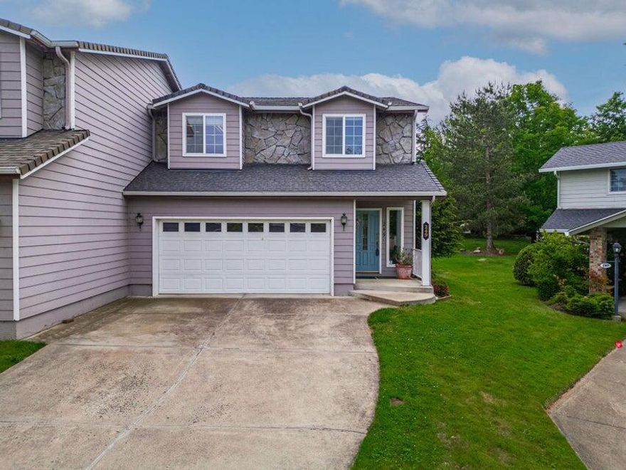 Welcome to this well-maintained and lovingly cared for 3 bed, 2.5 bath townhome with 1,555 sq ft of comfortable living space.  Nestled near charming downtown Ashland, this home offers the perfect blend of convenience and tranquility. Inside, you'll find a spacious kitchen with ample storage and a a large pantry--ideal for any home chef. The cozy living room features a welcoming fireplace, perfect for entertaining guests or relaxing with family. Enjoy large bedrooms, custom cabinetry in both full bathrooms, walk-in showers, and closet. The large laundry area is located upstairs. The low-maintenance backyard is ideal for easy living and the HOA takes care of the front landscaping.  Situated at the quiet end of the road with a peaceful creek view- this home is a true gen.