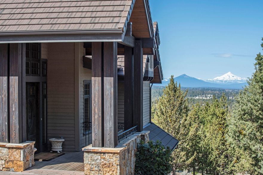 This majestic, timeless home on over an acre features panoramic views of the Cascades. Located in the prestigious North Rim neighborhood, (adjacent acre+ lot available) this home boasts over 6600 square feet, and has many luxurious amenities. 
One of a kind, main level master suite with imported marble, copper tub, mountain views and 2 spacious walk in closets.
3 additional, beautifully appointed en suite bedrooms, theater room, bar with wine cellar. 60 inch Wolf range, wool carpets, heated driveway, covered outdoor living spaces with mahogany deck.
This property is built to host your friends and family year-round.  
Offered beautifully appointed with high end furnishings.