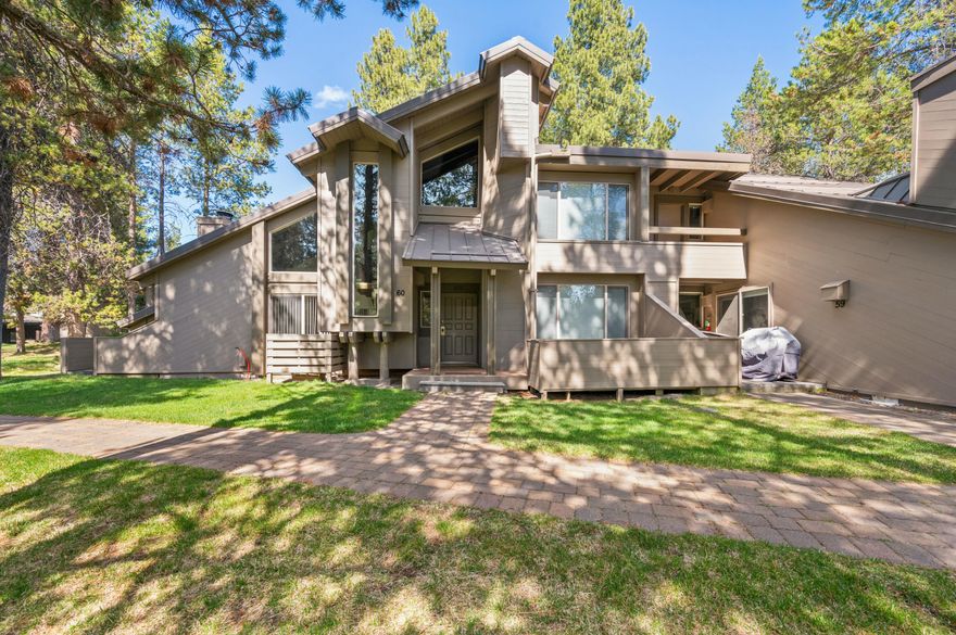 Perfectly positioned for lifestyle and investment, Tennis Village #60 offers prime proximity to Sunriver Lodge with its abundant amenities, including dining, entertainment, golf, aquatics, pickleball, fitness, and wellness, plus the charming Village at Sunriver. This air-conditioned, furnished condo boasts a modern kitchen and bathrooms enhanced with granite countertops and soft-close cabinets. Features include two primary suites, a loft, three patios with a BBQ, and an elegantly tiled wood-burning fireplace. Actively managed by Sunriver Property Management, rental history and bookings for 2025 are available for review.