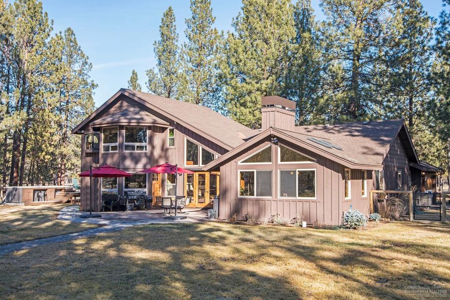 Remodeled home with 4000+ sq ft heated shop with guest quarters, RV storage and 4 double-deep bays and 6 stall barn and corrals. Adjoins National Forest. Just 2 miles to downtown Sisters. 4 bedroom, 3 bath, kitchen remodeled by Neil Kelly and home remodeled by Laredo Construction. 18' swim spa with bar, paver patio and path to barn. Back exit to Pine St.