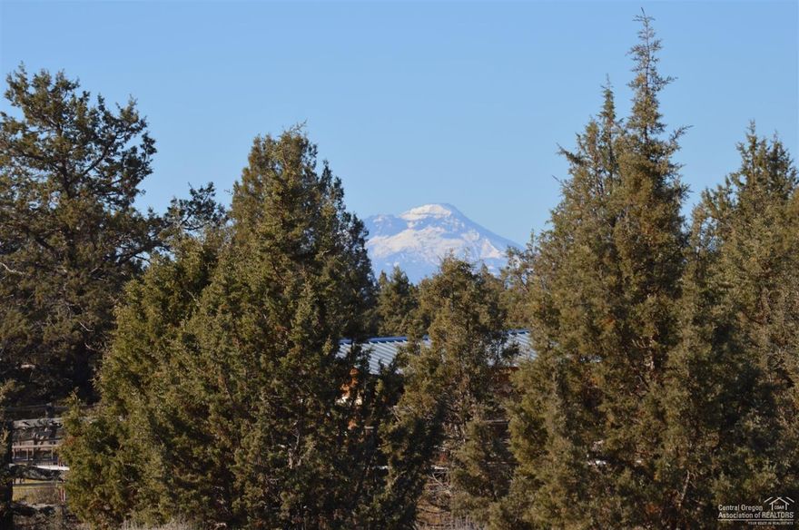 You have mountaintop views when you walk this beautiful property with awesome panoramic view potential from multiple building sites when you build your dream home. 5.64 acres with neighbor fencing on two sides. These flat, 5+ acre view parcels are becoming much harder to find in this price range and this one is ready for you to develop. 2019: property has been surveyed, septic is approved for cap/fill and copy of bid avail for PP&L, power is already there, just need to connect, current bid is less than $5,000 based on east side of lot connection site. Buyer's to do own due-diligence with PP&L. No need to dig a well, CRR Water is at the road and ready to hook-up. Great soil, flat lot, mature trees, beautiful views and almost no rocks make this a perfect place to enjoy the peace and quiet of Crooked River Ranch living.
