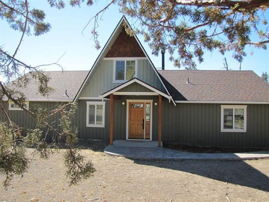 Beautifully remodeled chalet on 5 acres. Features a great room floor plan with vaulted ceilings and dramatic windows. Granite counter tops in the kitchen & bathrooms, fireplaces in the living room & master, Brazilian cherry floors & a spiral staircase to the loft. Very private location! This is a Fannie Mae Homepath property. HOME IS NOW IN AUCTION STATUS. Please register at Auction.com to make an offer.