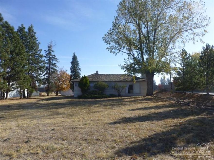 Potential Future Development opportunity in SW Bend. This home has 1805 Square Feet, set back from street on 0.79 Acre lot. Located in a desirable area for potential Multi-Family units. Includes, 3 Bedrooms, 1 Bath, with Hardwood floors, built in cabinets, New Dishwasher, New Range/Oven, laundry room and Full Block Basement. Close to Shopping, Schools, and the Old Mill