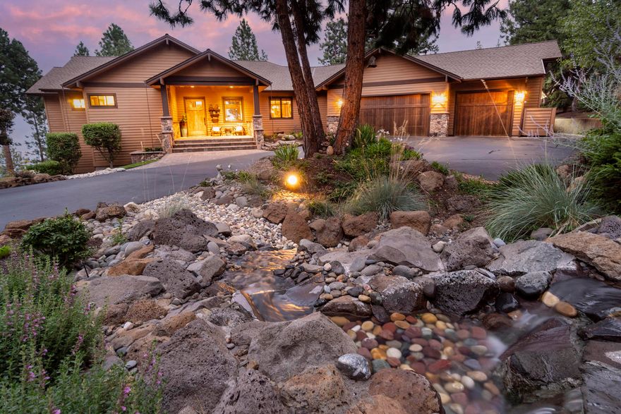 Stunning Gary Norman built hm who prides himself w/ exquisite care to detail & inspired from the Gamble House in LA. Tucked in from the street, you'll notice that this hm is special as you meander up the driveway through the lush landscaping & listen to the sounds of running water. Once you enter, one can see the vast views across the great rm. Montana mossy stone fireplace, wood beamed ceilings, wonderful built-in cabinetry adorn this rm & if you look up at the beams, you'll see that they are joined on a diamond cut truly showcasing the quality inside. Gourmet kitchen has slab granite & commercial grade appliances. Master suite is on main level & has sitting area, fireplace & just unwind as you take in the forever views. Downstairs, you find the family rm, 2 en-suites, fridge, sink & microwave.Then you go outside & say WOW! Bubbling creek, outdoor BBQ area complete with & your private golf green making this truly an entertainers delight. Explore this one of a kind home!