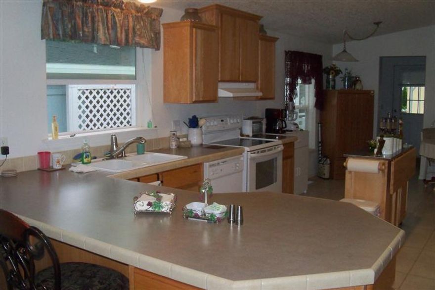 Beautiful 3 bedroom, 2 bath home built in 2004 with 1620 sq/ft large kitchen with lots of cabinets and counter space, breakfast nook, dining room, master bedroom with sitting room, master bath has large garden tub and separate shower. This home still looks brand new and is one of the best deals in Shady Cove.