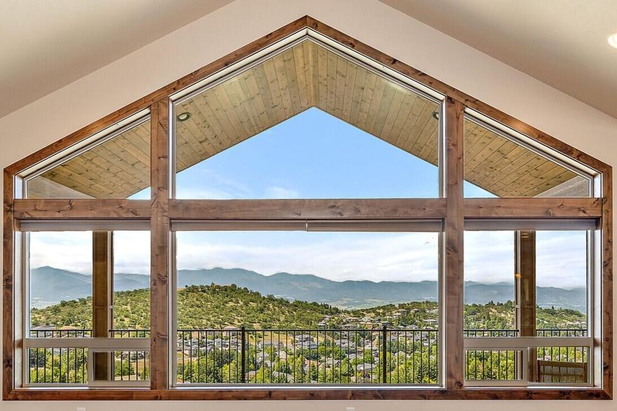 VIEWS!!! 180º panoramic, unobstructed valley, city and mountain views welcome you into this custom-built home completed in 2018 in desirable East Medford. Massive HOME THEATER w/14ft screen and surround sound awaits you in this warm and rich 3,307sf, 5 bed, 3.5 bath luxury home on .25 ac. Open floorplan main level w/ breathtaking views, vaulted ceilings, cozy stone fireplace, master bed, 2nd ensuite, Acacia wood floors, powder room, laundry room, and built-in knotty Alder shelves. Kitchen has granite countertops, LG ss appliances, large island and pantry. Sliding doors lead to two 500sf decks. Downstairs has 3 bedrooms, family room and bath. Unfinished basement space can be utilized if needed. The front yard xeriscape and backyard ORCHARD w/ a variety of grapes, apple, pear, plum and cherry trees complete this dream home. Spectacular sunsets, endless trails, sledding, twinkling city lights, watching the weather change and the peace of living in a CUL-DE-SAC are some of the many perks!