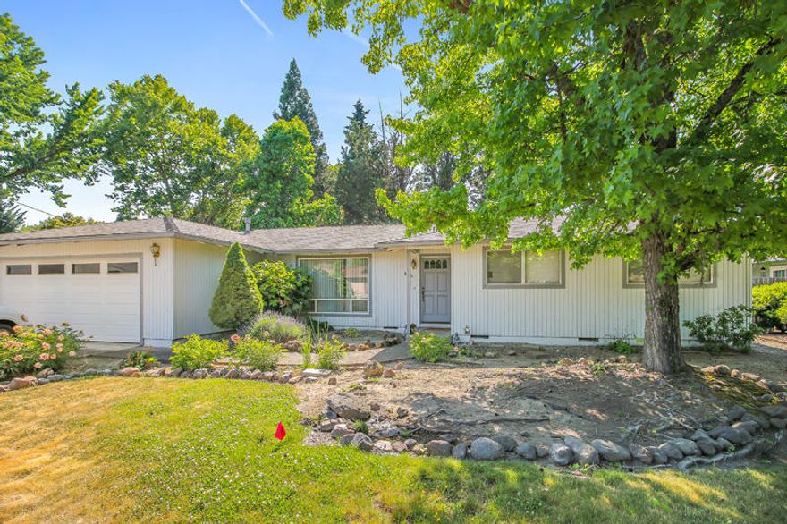 Lovely East Medford home in desirable neighborhood. Fantastic floorplan with formal living room and cozy family room with fireplace. Bring your green thumb and return the huge backyard to it's former glory. Covered deck is perfect for entertaining. Close proximity to I-5, medical services, schools and shopping.