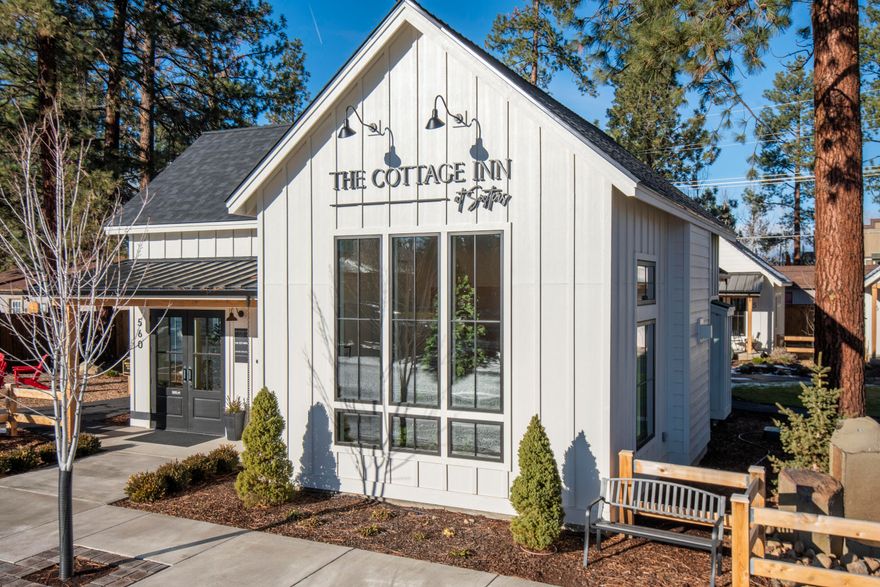 Award winning boutique Hotel nestled in the scenic mountain town of Sisters. Key-less entry to six charming individual cabins. Units and main lounge are surrounded by lovely grounds and walkways. Each cabin has a front porch perfect for outdoor enjoyment. Located close to shopping, entertainment, eateries and coffee. Each cabin is artfully decorated and will give you the comfortable feeling of home. Beautifully appointed units include tiled walk-in shower with heated floors, seating area, king-sized bed, gas fireplace and snack bar. Bridal suite will accommodate a larger group. ADA certified unit situated to take in courtyard views. Built in 2021. Downtown Commercial zoning. Lounge area could be utilized as an office space, retail or event space. Sisters has been named as a top visitor destination spot. Centrally located to lakes, hiking, fishing and highly rated ski resorts. Amazing opportunity to own and operate a beautiful resort in the heart of Oregon's playground.