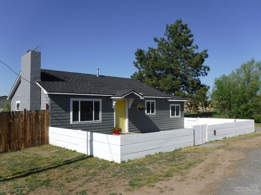 Adorable remodeled Redmond cottage with stunning mountain views, lives large with a wide open floor plan. Brand new architectural roof, Hardiplank siding, EnergyStar vinyl windows, engineered hardwoods and ceramic tile throughout, fresh interior paint and new natural gas stove. Fully fenced yard with RV parking. Walking distance to downtown Redmond breweries to the west, and 1 block east to BLM for bike/ATV riding or shooting.