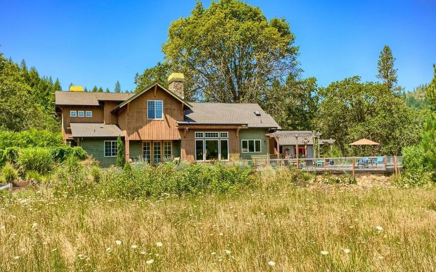 Rogue river frontage custom architect designed home on 73 acres. This property has almost an 1/4 mile of Rogue river frontage, Pasture, custom barn, Coop, and Garage. The home provides a master bath in the owners suite with soak tub, Family room and two Fireplaces, Pool, Garden, outdoor Sauna, with outside Bar B Que under covered deck, along with pool house changing room and bath. There is 34 acres of pasture with 34 acres of irrigation rights. Custom barn for livestock, Excellent Salmon fishing from your bank or enjoy the deer, turkey and elk that share the property with the owners. The property backs to several thousand acres of public land for your recreational enjoyment. The ranch is located just north of Medford Oregon and within minutes of the Lost Creek lake for trout, boating and recreational use.