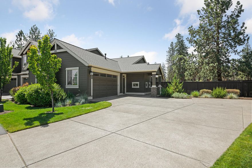 Welcome home to this beautiful, hard to find, single level town home. The arched entry invites you into the open great room with hardwood floors and a gas fireplace. This well maintained home has a large kitchen with granite counters, gas stove & pantry. There is a small office space off the kitchen that could also be a mud room. This end unit has an extra large lot for privacy. It boasts a big back yard and large driveway that can accommodate lots of guest. The community of Stonegate has a pool and meeting room. Close to golf and shopping.