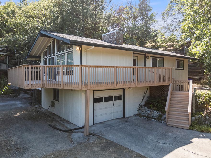 Have you been searching for a peaceful retreat tucked away in a quiet neighborhood on a large lot? Look no further! This 3-bedroom, 3-bath home offers comfort and versatility. Enjoy your morning coffee and sunrise from the wrap-around deck and very little wind. Inside, large windows fill the living room with natural light, creating a warm and welcoming space to gather with family and friends. The bedrooms provide plenty of room for everyone, and the lower level offers endless possibilities: create a guest suite, mother in law suite, playroom or your dream hobby or craft space. Recent updates include a newer HVAC system, refinished deck, full bathroom downstairs and updated large laundry area. Outside there's a fenced garden area, shed and space with lots of possibilities. Away from the hustle and bustle yet just minutes from the beautiful Roque River and all that Grants Pass has to offer.