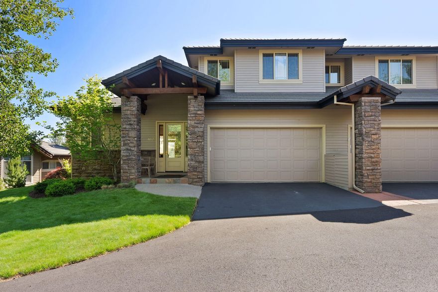 Beautifully updated townhome in Broken Top, ideally positioned along the 18th fairway & offering low-maintenance living in one of Bend's premier gated communities. Step inside to find new laminate wood flooring throughout the main level & a thoughtfully updated kitchen featuring newer appliances, designer lighting, & a stunning waterfall-edge granite island. The open-concept layout is filled with natural light, enhanced by vaulted ceilings & access to a private deck with a custom pergola plus new Trex decking—perfect for relaxing or entertaining. The main-level primary suite also opens to the deck & includes a spacious bathroom with tile floors, a jetted tub, a full tile shower, plus dual sinks. Upstairs, two generous en-suite guest bedrooms provide comfort and privacy for family or visitors.