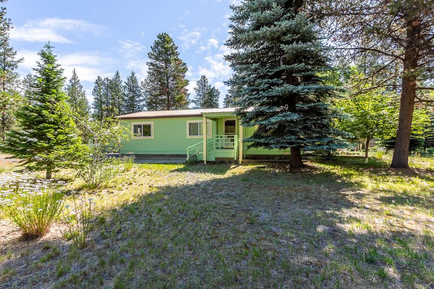 Lake Life is calling...don't miss this IMMACULATE HOME! This beautifully maintained home is placed on a corner lot and is just blocks to the La Pine State Park & Deschutes River with close proximity to Cascade Lakes Highway and Mt Bachelor.  This home features 2 bedrooms, 2 baths, 1188 sq ft, 2 car garage, separate shop & storage buildings. All appliances included, makes this home move-in ready. 1/2 of the property is fully fenced leaving plenty of space for your little feet or four-legged friends to run! New concrete Septic Installed in 2016. This home includes all appliances and water softener. Home is off a paved and snow plowed and maintained rd. This home is fully electric, leaving tons of savings on your heating and electric bill, averaging around $1200 per year.