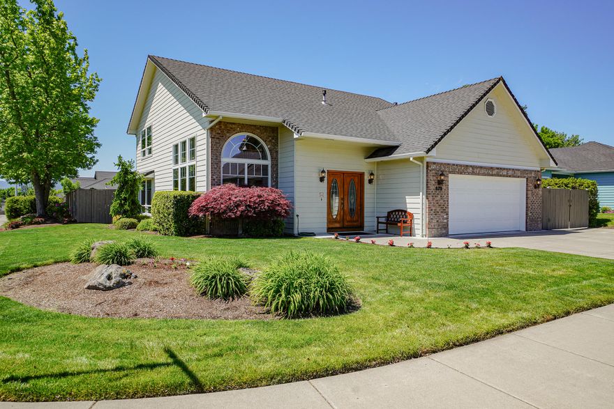 Absolutely beautiful, fantastic, stylish, must see home in highly desirable Central Point neighborhood. 3 bed, 2.5 bath 2,678 sq. ft. Home truly has it all; Main floor includes primary suite/bath with cultured marble tops and floor.  Kitchen has pantry, island, gas cooktop, built-in oven, built-in microwave. Living areas include vaulted ceilings, hardwood floors, gas fireplace. Upper floor includes family room, office, 2 bed, full bath. LARGE SPACIOUS ROOMS. Beautifully maintained landscaped yard, covered patio, inground sprinklers. HUGH RV parking area, water/power. So much storage, walk in attic.