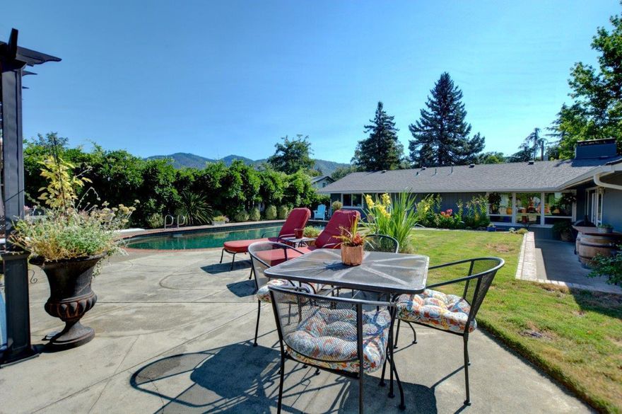 Proudly Featuring this northwest single level ''oasis in the city'' home! This three bedroom, two bath, single level house has had many upgrades and sits on a large treed corner cul-de-sac. The kitchen is indeed a focal point with granite counters stainless appliances and an eating bar. The rear yard features a gorgeous inground Pebble Tec Pool, many flowerbeds and a sitting area with covered pergola. There is a bright and light sunroom with skylight, an attached garage and room to park the toys! Very cozy living room with corner fireplace and separate dining... Don't wait too long on this beauty!