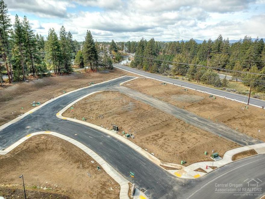 Experience Bends West-Side. New Town Home Lots on Bends West-Side across the street from the Deschutes River Trail. Listen to the music from the Amphitheater at the Old Mill or walk down for special events, concerts, theater, and shopping. They won't last long. Lots 28, 29, and 30 being sold as a 3 Town Home Unit.