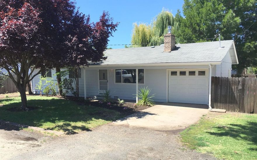 Cute Cottage style home recently updated and gone through with a wonderful, large and relaxing back yard. Enjoy the new heating and air unit, new dishwasher, new paint inside and out, new carpet, electrical outlets, light switches and light fixtures with LED lighting for efficiency and long life. 3 bedrooms and 1 bathroom in East Medford, conveniently close to schools and shopping. Large back yard with 2 plum trees, berry bushes and sprinkler system. Garage has a workbench.