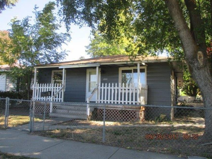 Affordable! This 3BR home is on a corner lot conveniently located near shopping, schools and public transportation. Needs some TLC and updating but is priced accordingly. Has a detached shop building that once served as a garage. Fenced yard. The 3rd bedroom which has a closet could be used as an office or den - it has sliding glass doors and even a wood stove.