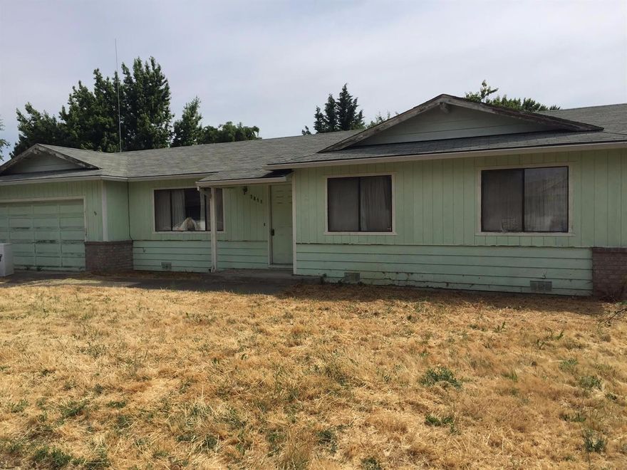 Near a great city park and close to both Central Point and Medford shopping and services! Located in a neighborhood with many restored older homes, this is a Great opportunity to earn some sweat equity! The home will need some TLC including paint and flooring. Three good sized rooms, two full bathrooms plus an office! The back yard is large, private and fenced. The garage is full sized and has additional storage overhead. The driveway has three-car parking and room for a boat or small RV.