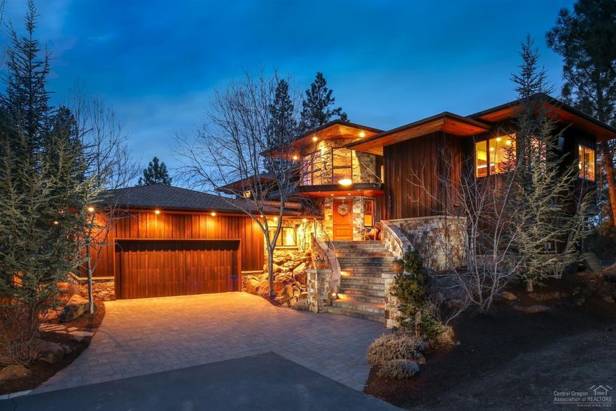 Exquisite craftsmanship is evident throughout this Gary Norman built home w/views of Mt. Bachelor, Broken Top, the River Canyon, and the sights and sounds of the Deschutes River below. This exceptional design highlights clean lines and perfectly placed windows for privacy & flooding the home with natural light. Luxury living includes an elevator, walk in refrigerator & freezer, & built in espresso machine. The low maintenance landscaping and oversized 3 car garage complete the package. View virtual tour!