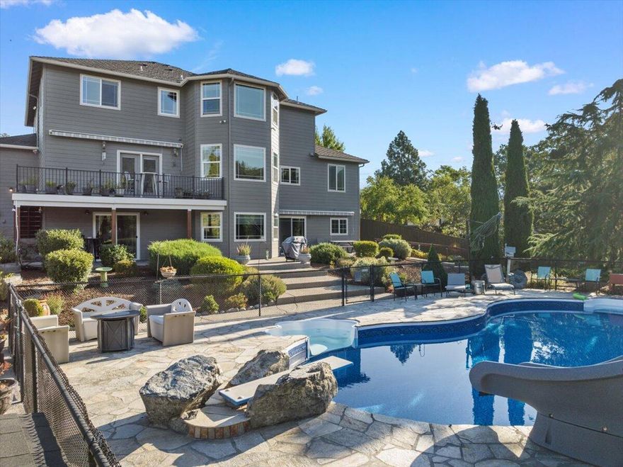 WOW! Instant Equity w/this below appraised value home! Extremely Desirable Old Stage Rd Location & 1-of-a-kind multi-family dream estate! There's a main home, add. living space on lower-level w/separate entrance, additional house next door +more. Back yard has a beautiful salt water in-ground swimming pool/diving board/rocks/upgraded slide, pool fire pump, fruit tree orchard, large garden area, & electric SunSetter awnings over back patios. Main home boasts upgrades including 28' ceilings in grand entrance, cherry wood floors, 2 fireplaces, custom woodwork, +more. Kitchen features high-end appliances, bar area, built-in wine rack, vegetable sink, island, granite countertops, custom cabinets & stunning mountain views. Large primary includes gas fireplace, tile shower, jetted tub, & walk-in closet. Lower level offers a large family room, bedroom, full bath, & kitchenette, perfect for an in-law suite or Airbnb w/separate entrance. Completely 100% perimeter fencing for massive privacy.