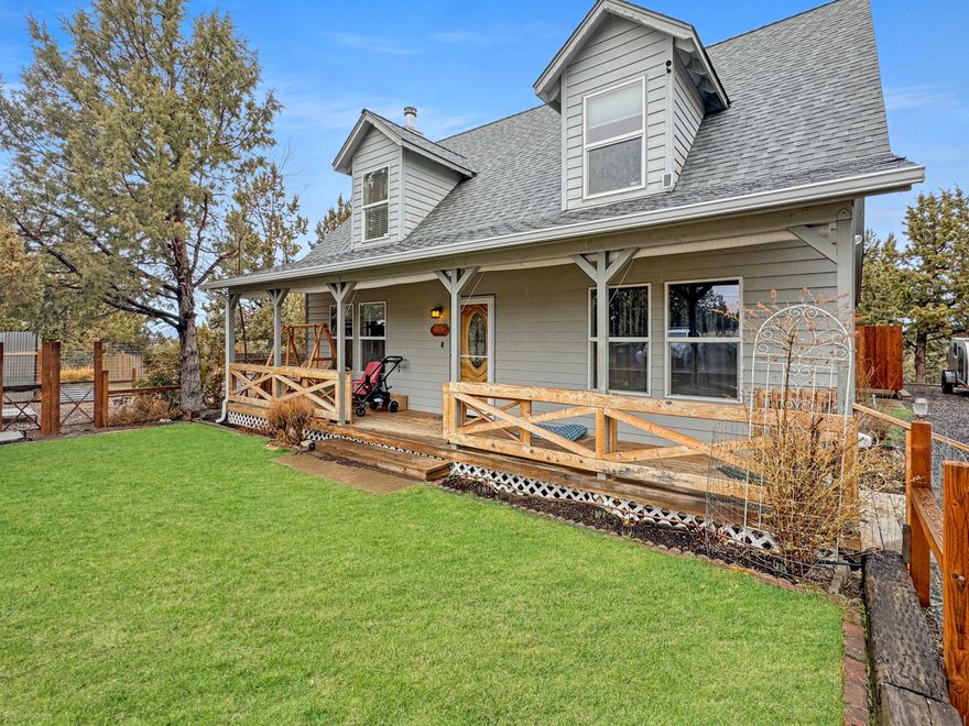 Discover the perfect mix of country charm & convenience on 2.21 +/- acres! This inviting home features rustic log railings, rich wood ceilings & a cozy propane fireplace. The great room boasts vaulted ceilings with a loft, while the bright kitchen offers an island with breakfast bar, dining area & nearby laundry.
The main level has two guest bedrooms & a bath. Upstairs, the primary suite includes a walk-in closet, double vanity, soaking tub & shower, plus an office with French doors that can be a fourth bedroom.
Enjoy the covered front porch, Trex deck & beautifully landscaped yard with grizzly rock & a fenced garden. Plenty of storage with a 320 +/- sq ft shop that is fully insulated & finished flex space with vinyl flooring & a workbench—perfect for an office, studio, or hobby room (no heating/cooling), enclosed carport & sheds, plus room for all your toys.
Updates include a new stove (2022) & roof (2018), with HOA-covered water & road maintenance.
Country living close to town!