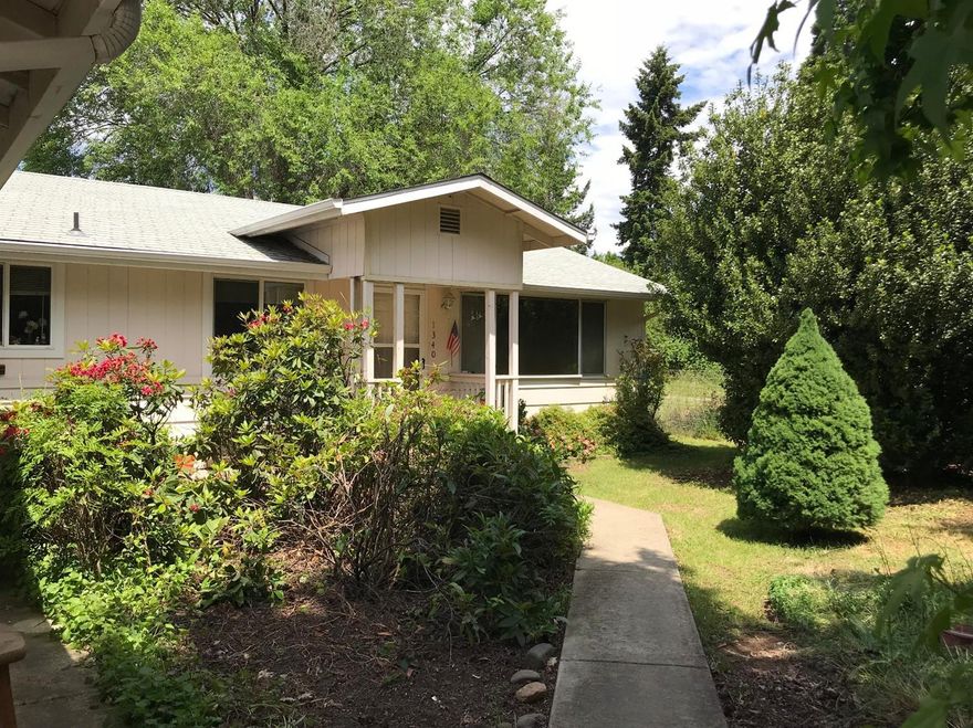 Great place to call home!! Conveniently located, semi-private setting on a .22 acre lot with a private well and city sewer. Clean and comfy. Features a split floor plan with separate living and family rooms, heat pump and an updated kitchen. Master suite and family room wing have a private entry for an in-law set-up or ??