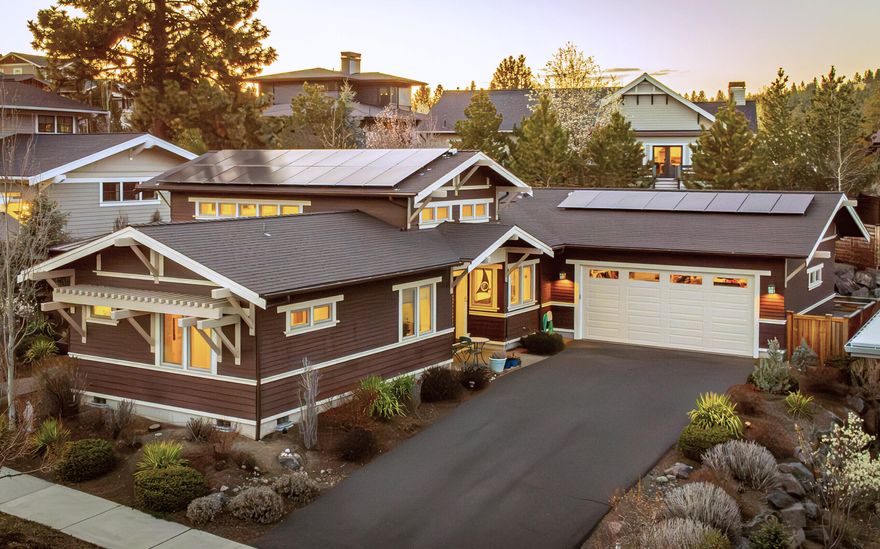 Single-level living. Elevated design. Light in every direction—with soaring ceilings to match. Located in NWX, this Earth Advantage Platinum and Net-Zero certified home by Greg Welch blends intentional design with energy-efficient features throughout. Just 0.2 miles to Compass Park, 0.3 miles to The Grove, and a block from Bend Park's trail system.

Clerestory windows, skylights, and solar tubes fill the open floor plan with natural light. The kitchen, dining, and living areas live as one bright, open space with views out to the private patio and premium Jetsetter® spa featuring silent circulation.

The spa-style primary suite includes a walk-in closet, heated tile floors, and a full tile shower. Outside, enjoy a covered front porch, side yard, raised garden bed, and shed. A long, level driveway leads to an oversized garage with built-in storage, a workbench, and a Level 2 EV charger.

Plus a 26 panel owned solar setup & net metering w/ power company. 10/10 Home Energy Score.