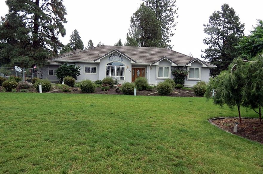 This is a wonderful home located on a fully landscaped acre on Collier Lane. It offers 4 bdrms and 3 full baths. There is Huge Great Room overlooking the tree shaded patio. An Expansive kitchen with Borror custom cabinets also provides informal dining and a wet bar. All windows overlook tall trees and green lawns. This home was custom built and has only had one owner. Too many amenities to list. One of a Kind..