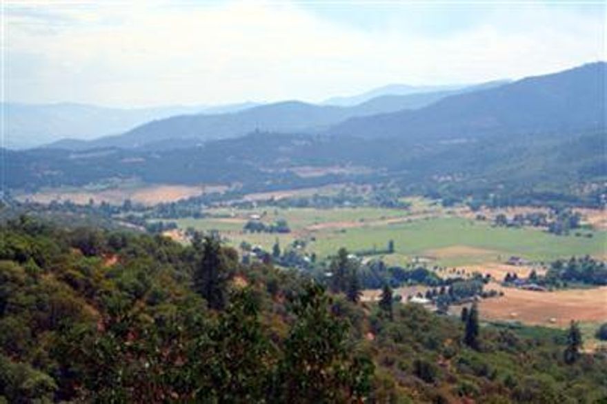 Ready to build your DREAM home in an ideal location? Conveniently located, at an affordable price! Well is drilled. 10 gpm per Seller. The views are breathtaking, enjoying the surrounding hills, mountains, and distant countryside. With easy access, and sloping-forested terrain, this property offers a lot of privacy and an excellent homesite location. Attached topo and aerial maps. Locked gate, appointment needed to view.