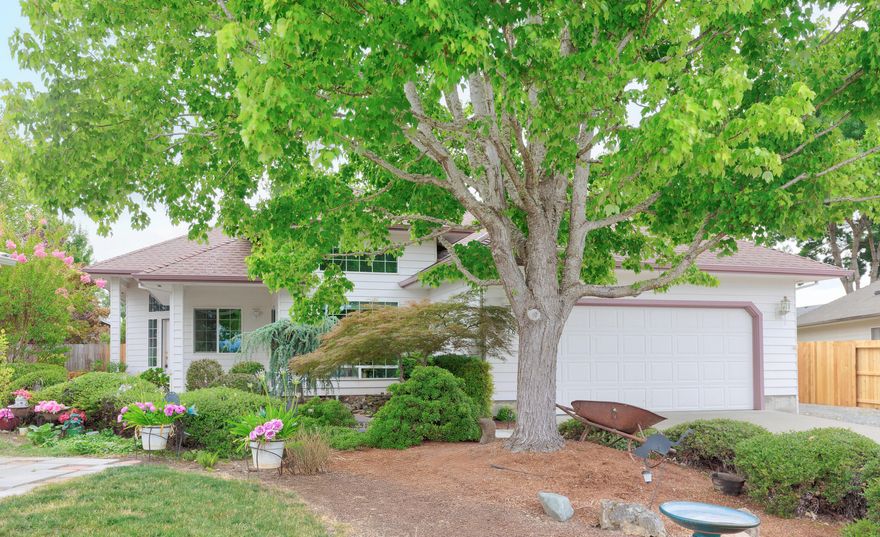 Discover this stunning contemporary 3 bedroom, 2 bath home tucked away at the end of a peaceful cul-de-sac! Soaring 10' ceilings & expansive windows create an airy, open feel filled with natural light throughout. The spacious kitchen boasts a corner sink with wraparound windows, a pantry, & instant hot water - perfect for the home chef. Enjoy elegant gatherings in the formal dining room with a slider that opens onto a private patio, ideal for indoor-outdoor entertaining. The primary suite offers direct deck access, creating your own relaxing retreat. Low-maintenance yard, newer fencing, tool shed, & dedicated RV parking add exceptional convenience. A truly inviting, move-in-ready home that blends comfort, style, and thoughtful upgrades - don't miss rare find!