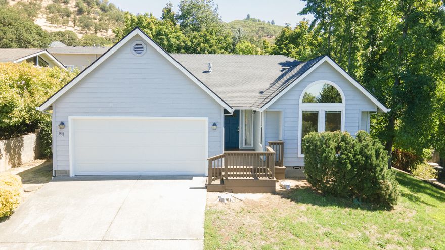 Charming Home with Two Living Spaces and Beautiful Landscaping!  Welcome to this meticulously cared-for 3-bedroom, 2-bath home offering 1,480 sq ft of comfortable living space. Featuring two spacious living rooms, this home is perfect for relaxing and entertaining.  Enjoy your morning coffee on the inviting front porch or living room taking in the mountain views.  In the evening unwind under the mature trees or on the private back deck that's great for entertaining!  With a 2-car garage with a built-in workbench, there's ample room for parking and hobbies.  Located in a peaceful and established neighborhood that's close to shopping, dining and I5.  This property is ready for you to move in and make it your own!!

*New Garage door and motor and new Heat Pump just installed.  Home and all carpet professionally cleaned and shampooed.