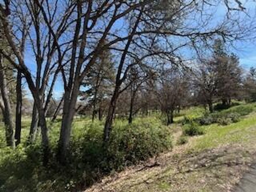 Check out this beautiful Running Y lot in the Lakeside neighborhood. Running Y Homeowners enjoy not only the natural beauty of the Running Y Ranch Resort, but also HOA amenities that include the Sports and Fitness Center with pool, hot tub, sauna, weight room, pickle ball and tennis court, playground and more. You can also enjoy the miles of paved walking trails, the Arnold Palmer golf course, and beautiful spa.