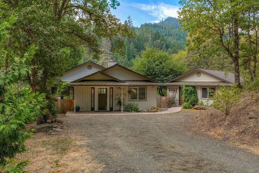 Private retreat with Southern Exposure in a serene location with a creek running through it. 17.20 acres with 100 year water rights, fenced, pasture area, 800 sq ft barn, garden areas, & chicken pen. Gated entry with RV parking. Cozy 3 bedroom, 2 bathroom home with open beam vaulted ceilings in the living room with large windows to take in the views, tile floors open to the kitchen that features a large island, stain less steel appliances, plant shelves & pantry closet. Office area off kitchen with built in desk. Large deck off kitchen & living room over looking the creek. Master with 2 closets, vanity area, slate floors and marble walk in shower. Detached 800 sq ft shop that has a laundry area with sink, and 2 separate rooms with certified wood stove, large windows, carpet. Property backs up to BLM on 2 sides offers access to great hunting. Newer heat pump in 2015.