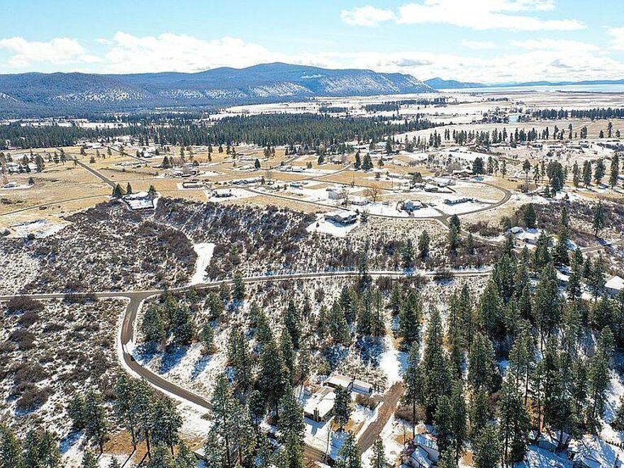 This beautiful treed lot in Chiloquin, Oregon, within one mile of the brilliantly blue Agency Lake, is just begging for a dream home or vacation home to be built on it. In fact, if someone else doesnt claim it soon we might take the opportunity to keep this .6 acre lot for ourselves. ;)

Virtually crime free and dotted with waterfalls (hence the name of the nearby city Klamath Falls), Chiloquin is perfectly situated for a quiet life in a progressive state. Become one with the outdoors by making time to visit Crater Lake National Park and Hagelstein County Park, both less than 25 minutes away from your new home.

With residential zoning and power nearby, you can start building in no time!