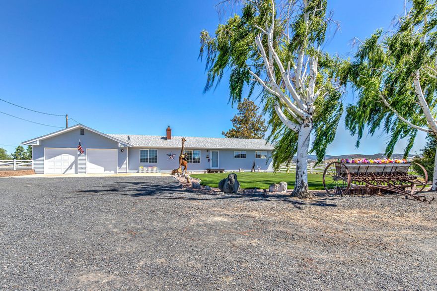 Looking for country living close to town in a highly desired area of Prineville? This is it! This property is a total of 17 acres on 2 parcels with 14.8 acres of irrigation. The 4 bedroom (2 masters), 3 bathroom home, with an attached 2 car garage with 8' doors, has plenty of room for family and guests. Additional improvements include a 3 bay shop with cement floor, barn, RV/boat storage with hook-up and a 40x60 pole barn with a 12x60 lean-to, perfect for storing hay and equipment. The large, fully fenced pasture is ready for your livestock to call home or lease out the pasture. The second parcel (141626C004100) has septic and shop approval. Buyer to do due diligence regarding possibility of building dwelling on this parcel. This is a very quiet country setting, with the crossroads, Johnson Creek Road and Wainwright Road, used mainly by local traffic. This property has everything you would want in a small acreage! Come see for yourself how quiet and beautiful this country setting is.