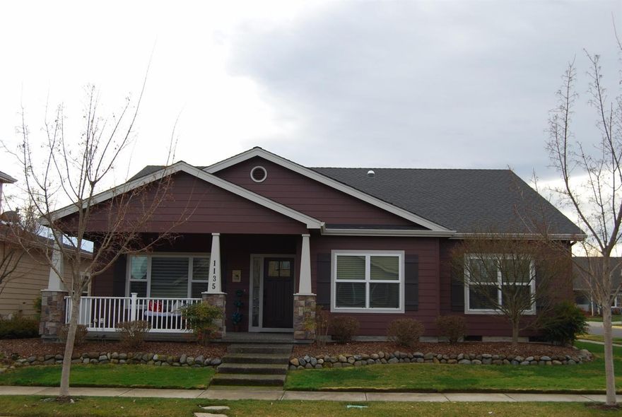 Beautiful Craftsman style single level home in the Jackson Oaks Neighborhood of the award winning Twin Creeks Development. Inviting LARGE front porch and stone columns for terrific curb appeal Great floor plan designed for entertaining w/ spacious formal dining room with built-in bookshelves and coffered ceiling, island kitchen w/breakfast bar, gas cooktop, wall oven, & prep sink, and HUGE great room with fireplace, coffered ceiling, ceiling fan, & french door to rear covered patio. Double doors to large 3rd bedroom/den. Utility room w/xtra cabnetry. 18x13 master with coffered ceiling, ceiling fan, walk-in closet, and deluxe bath w/custom shower &dual sinks; french door to patio. Guest bath with solatube. Tons of hardwood, wide hallways & doors, alley loaded extra deep finished garage with built-in included cabinets. White vinyl fencing and newer exterior paint. This beautiful one-owner home is move in ready and shows perfect!