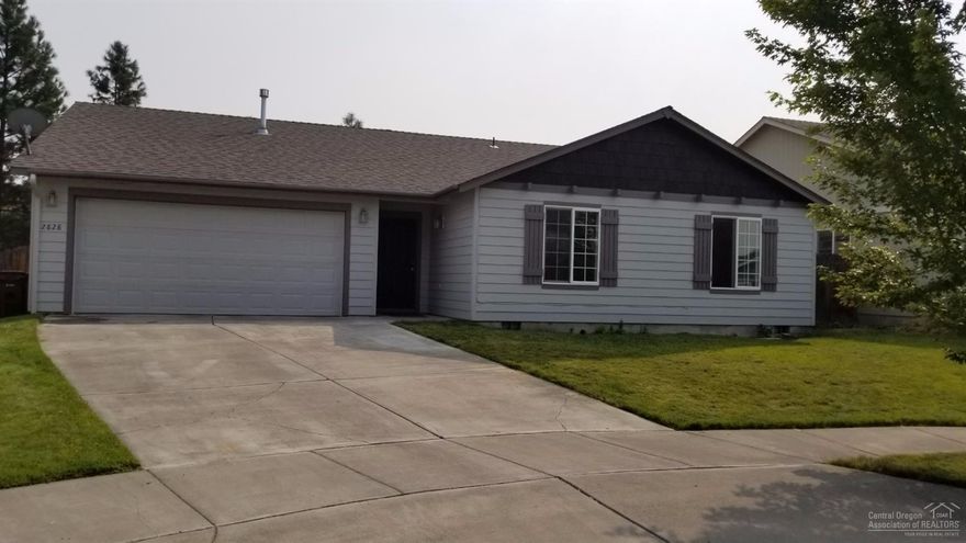 Updated home in a quiet neighborhood offers laminate wood look flooring throughout, new recycled glass counters and back splash in kitchen, and includes refrigerator, microwave, dishwasher and stove. The remodeled master bath has quartz counters and an oversize jetted tub with shower. There is an extra 104 sq ft addition to the master bedroom with french doors that open to the wrap around back deck. Yard is fenced for privacy.