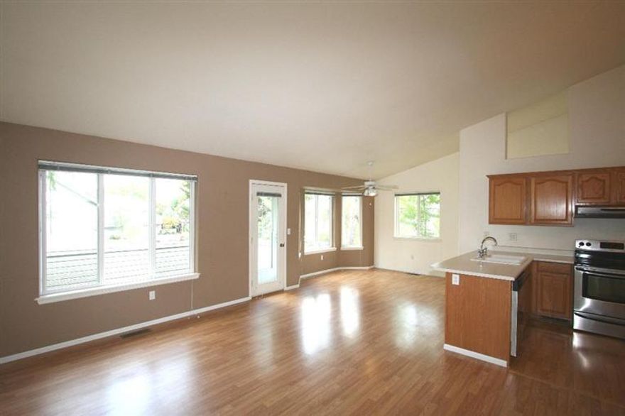 Central Location and in the Lone Pine School District. 3 spacious bedrooms, 2 full baths, single car finished attached garage. Upstairs offers an open kitchen, dinning area and large living room with access to the upstairs deck/balcony. Plenty of natural light throughout. Downstairs are two additional bedrooms and a full bath plus a laundry room. The community pool and club house is located close to this unit.