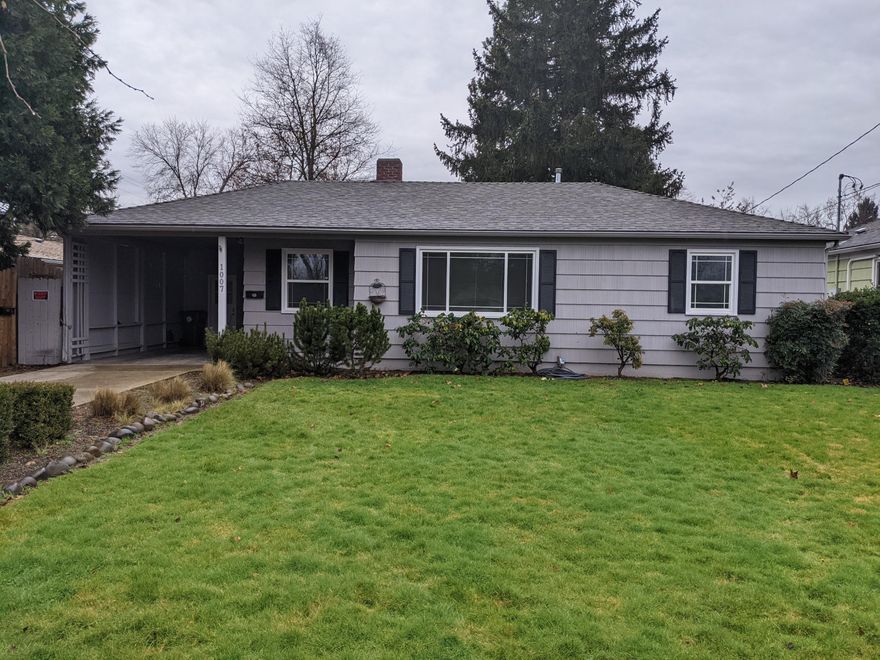 This home is move in ready.   Front home features two full bedrooms and one full bathroom.  There is a fireplace in the living room with natural light flowing in.  New paint and flooring.  Central air and heat.  The back home is a studio with a full kitchen and full bathroom with 406 sq. ft of living space.  POSSIBLE TWO FAMILY SET UP!