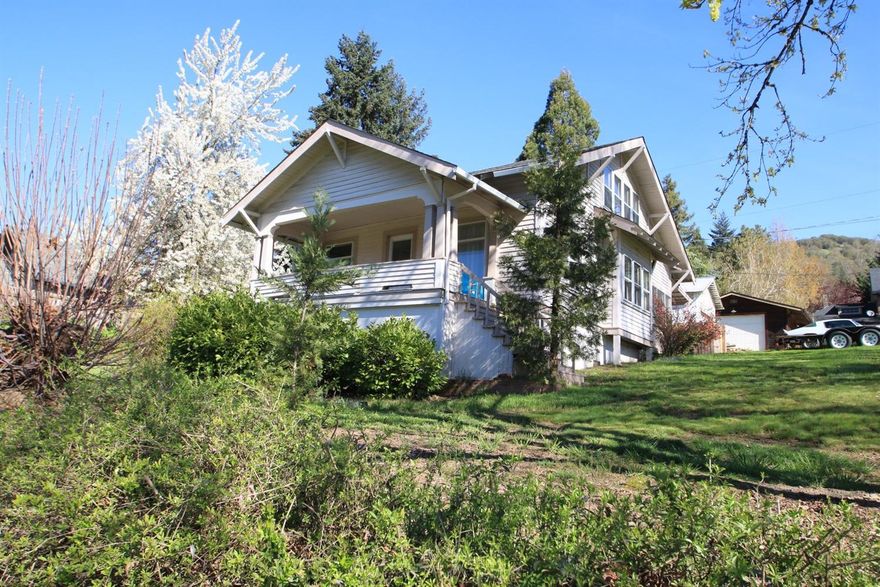 Wow! This home is stunning, move-in ready, turn of the last century with ALOT of updates: 3 bed, plus bonus room, 1 bath, 1400 sq ft, original claw foot tub in the bath, forced air heating, new hot water heater, new roof, and SO MUCH MORE! Approx. 200 sq/ft garage/shop with concrete floor, ample parking for your RV and more, two lots included in the sale totaling .29 acres. May be suitable for development. We were just blown away by all of the upgrades: stainless appliances are included, has a approximately 2 year old heat pump, great location in the heart of Gold Hill. Did we happen to mention the sun room? This one is a must see and qualifies for several types of financings including zero-down USDA!