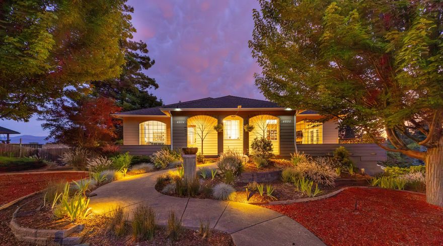 Two homes! Spacious 4,639 sq ft total, 3-stories, 4 car garage - all custom-built in 2004 w luxury & practicality in mind on a 0.22 acre lot. 

Main home features 3 bedrooms, 2.5 baths, living room (w pull down 10 ft movie screen projector), office, kitchen w granite countertops, 14 ft island that seats 10 chairs comfortably, formal dining w 9 ft ceilings, & ADA friendly hallways & bathrooms.  

The attached second home at 4604 has a separate entrance w main level living & potential for rental income. Includes 1 full bedroom, full kitchen, living room, bathroom, & laundry w deadbolt doors for add'l privacy from the main home. 

Huge 1100 sq ft basement plumbed for a future bathroom or use for even more storage needs. 

FOUR car finished 1100 sq ft garage + Storage galore in pantry room w ductless HVAC unit. 

Easy to maintain & beautifully landscaped yard, 25 ft rock climbing wall & stunning views of the valley. 

Close to town for amenities, hiking, biking trails & more!