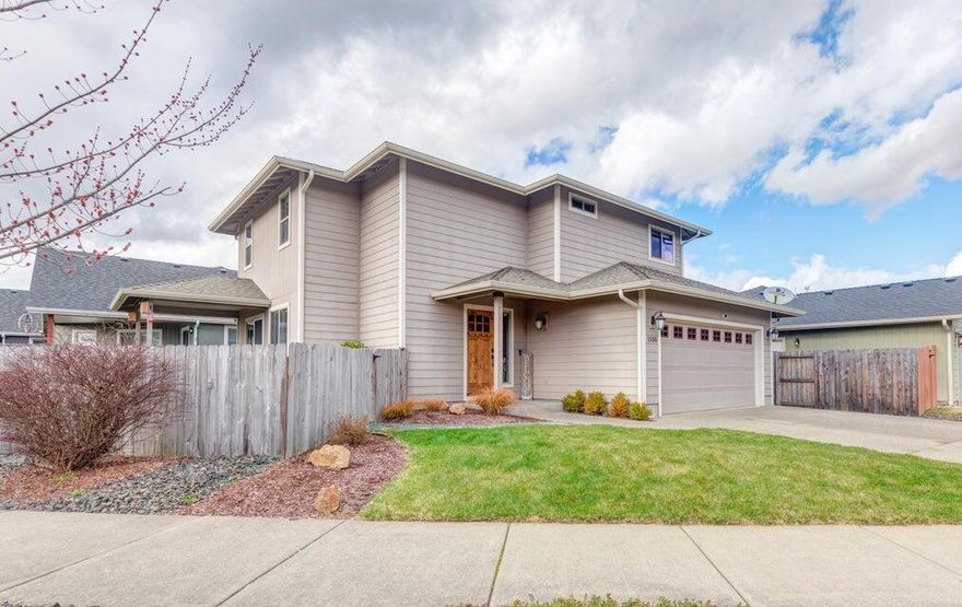 Welcome to this light and bright updated Kirk Chapman Home! Warm and welcoming new interior paint and laminate flooring. Large pantry and open floor concept on first floor with 1/2 bath, kitchen, dining and living room, laundry room. Second story has a large main ensuite with a walkin closet and  full bath as well as two spare bedrooms and full bath. The yard has easy maintenance landscaping and an automated sprinkler system. Privacy fencing and back patio to enjoy the sunrise! Large two car garage. Easy access to shopping, parks and amenities. Easy to show!